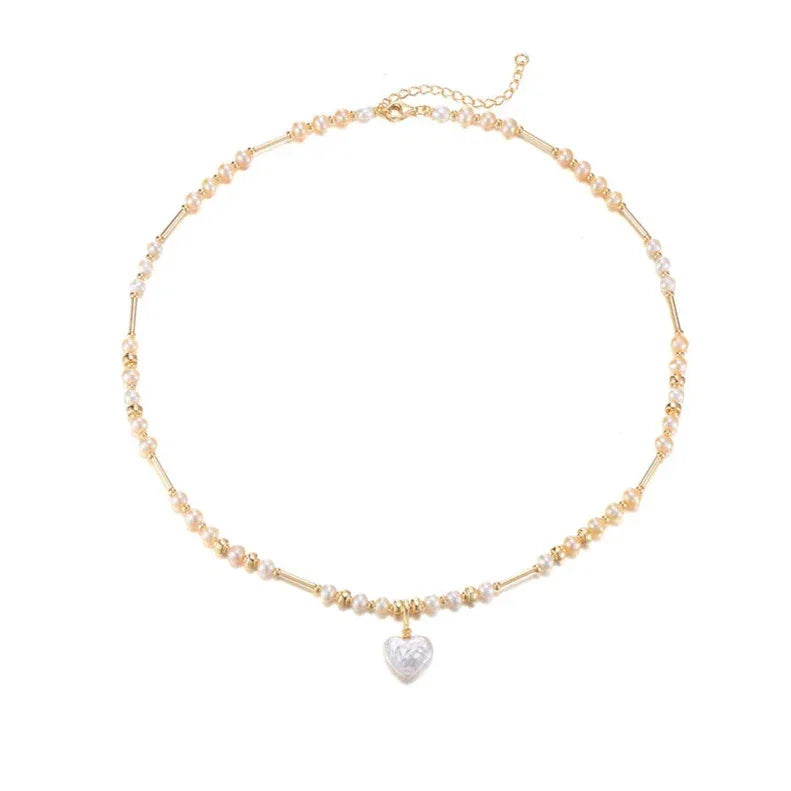 Baroque Pearl Heart Pendant Necklace with Gold Bar Accents — isolated full circular necklace view