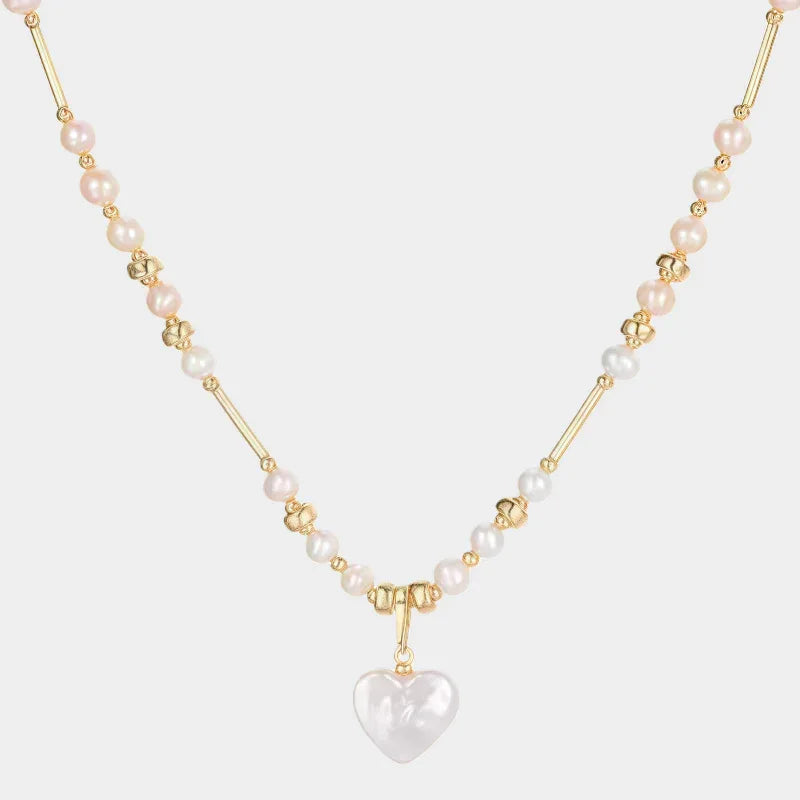 Baroque Pearl Heart Pendant Necklace with Gold Bar — front view of pearl-and-gold-bar necklace with a translucent pale heart