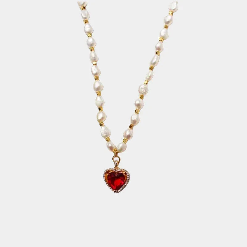 Pearl Strand Necklace with Red Heart Pendant — front view of pale pearl strand with a red heart pendant
