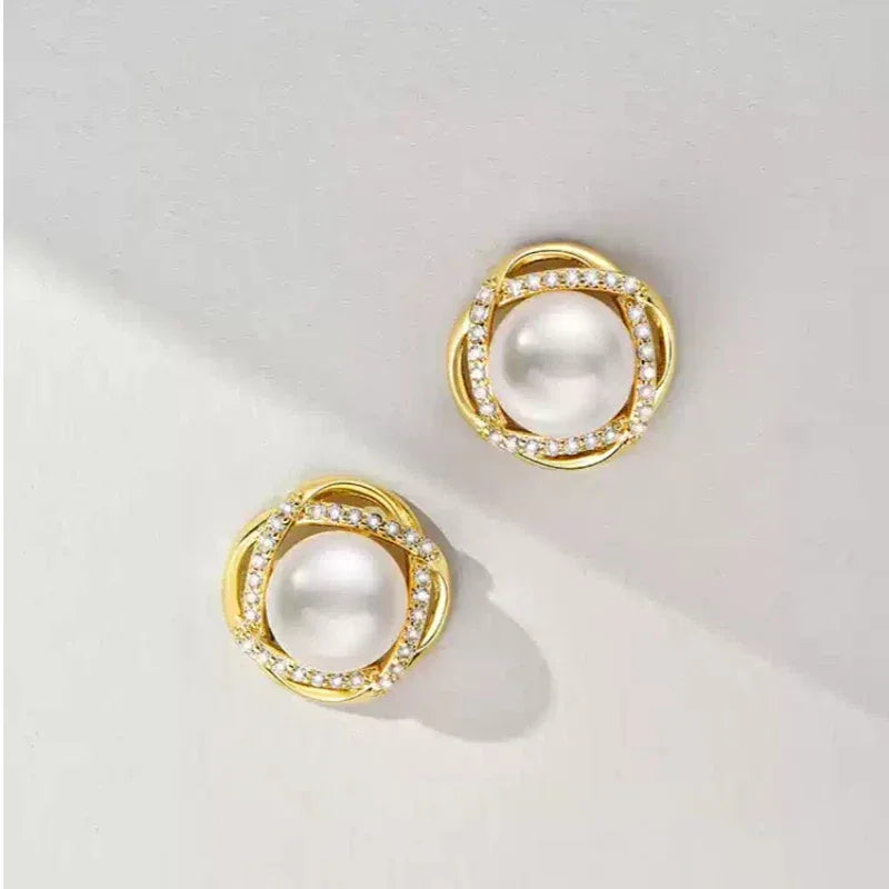 Pearl Halo Stud Earrings — front pair on white showing design and scale