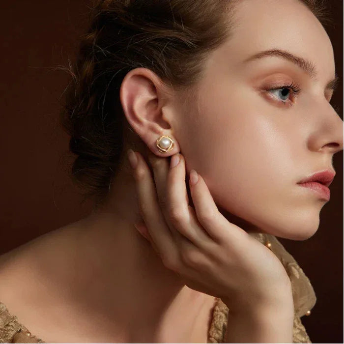 Pearl Halo Stud Earrings — side-profile portrait showing the stud scale