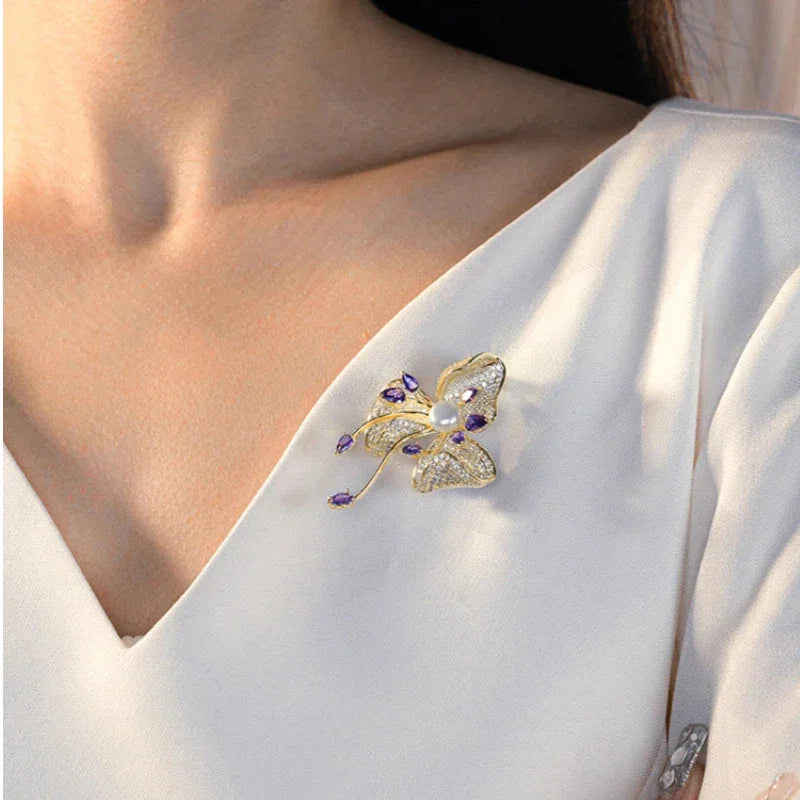 Freshwater Pearl and Cubic Zirconia Bauhinia Brooch — second white-blouse worn view from another angle