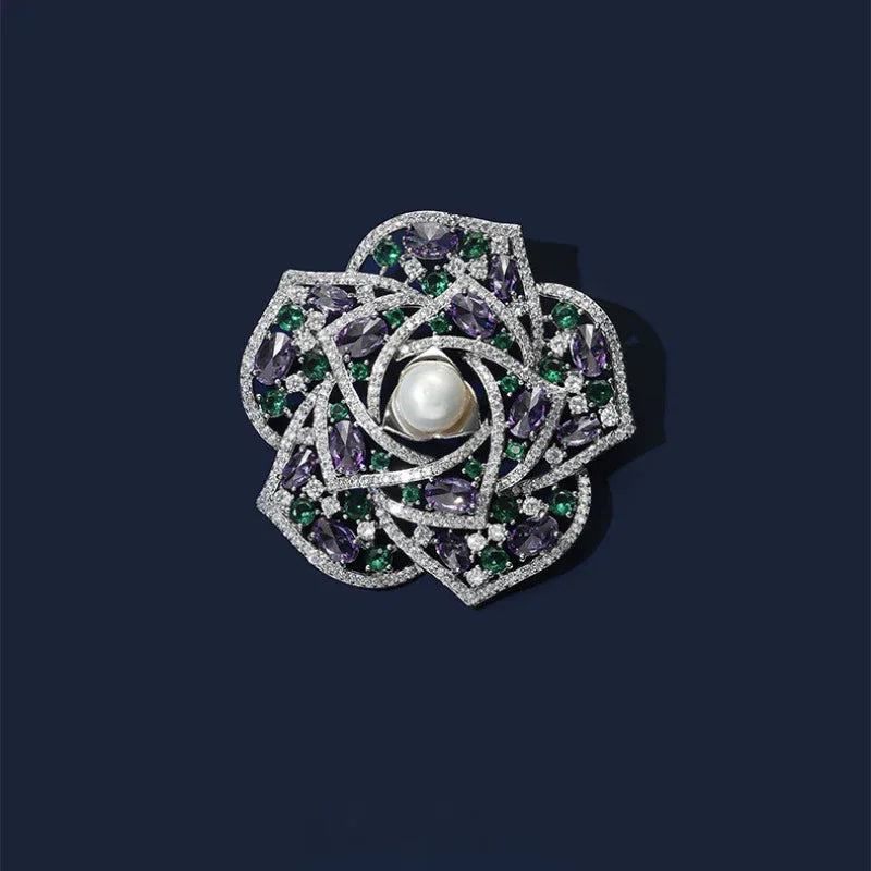 Pearl Purple and Green Camellia Brooch — front product view on a dark background