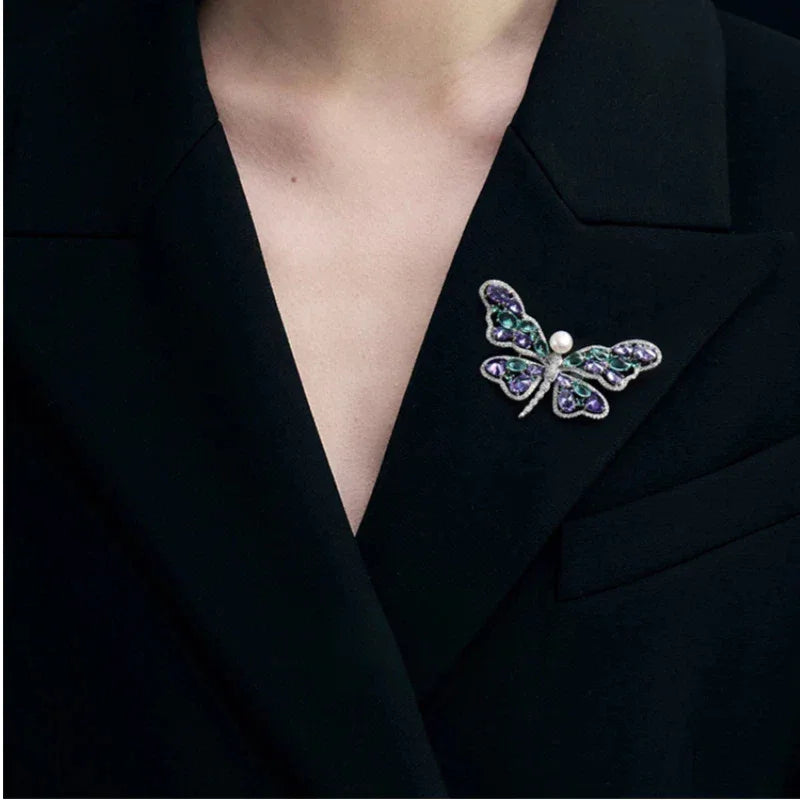 Pearl Purple and Aqua Butterfly Brooch — close black-blazer worn view showing scale