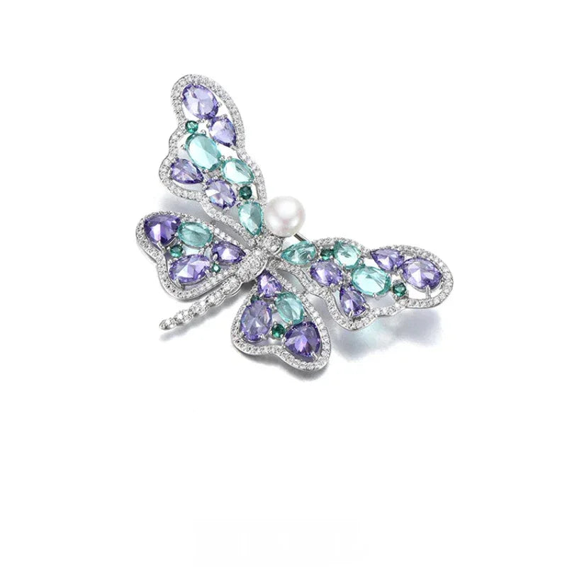 Pearl Purple and Aqua Butterfly Brooch — angled product view on white