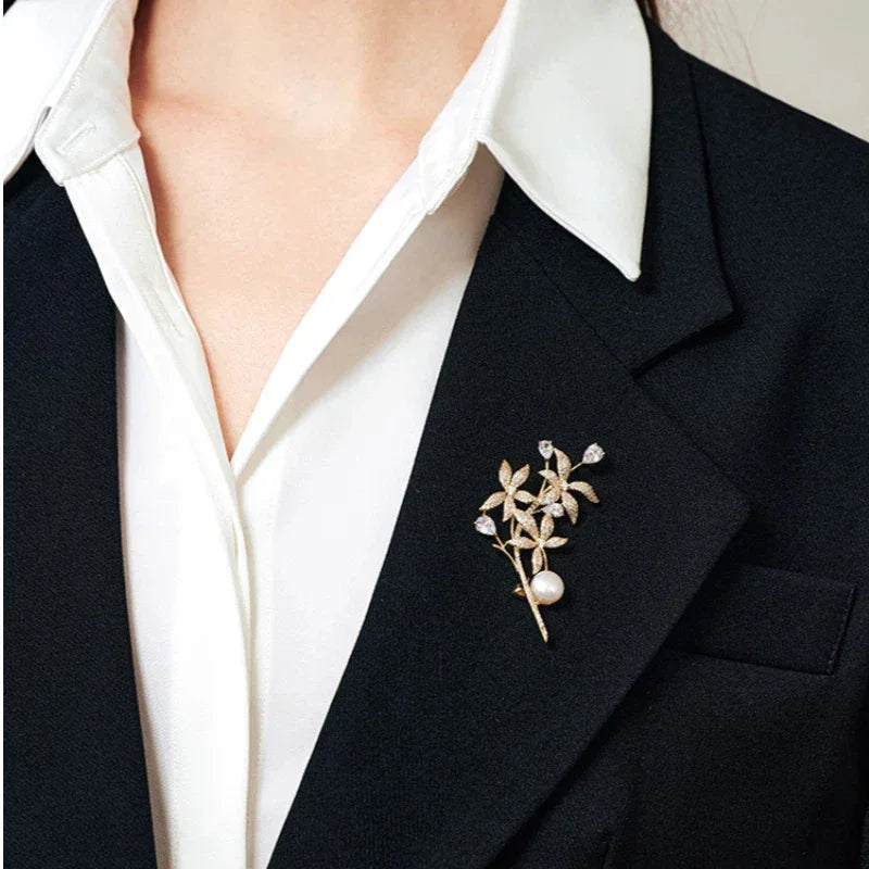 Freshwater Pearl Daffodil Branch Brooch — close blazer-worn view showing scale