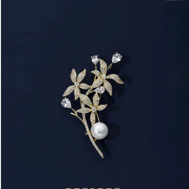Freshwater Pearl Daffodil Branch Brooch — front product view on a dark background