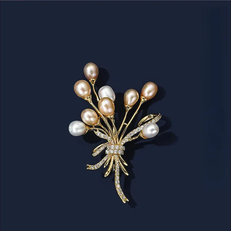 Two-Tone Pearl Spray Bouquet Brooch — front product view on a dark background
