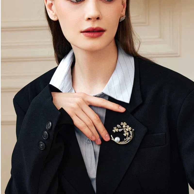 Freshwater Pearl Crescent Floral Brooch — waist-up model portrait showing scale