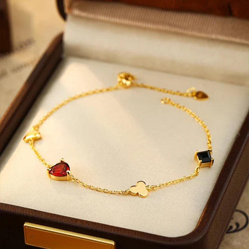 Garnet and Black Onyx Adjustable Bracelet bracelet arranged on a jewelry display