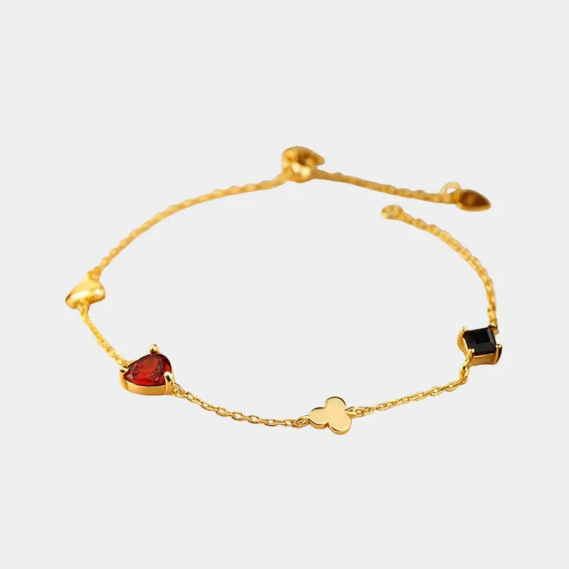 Garnet and Black Onyx Adjustable Bracelet full bracelet view on a light background