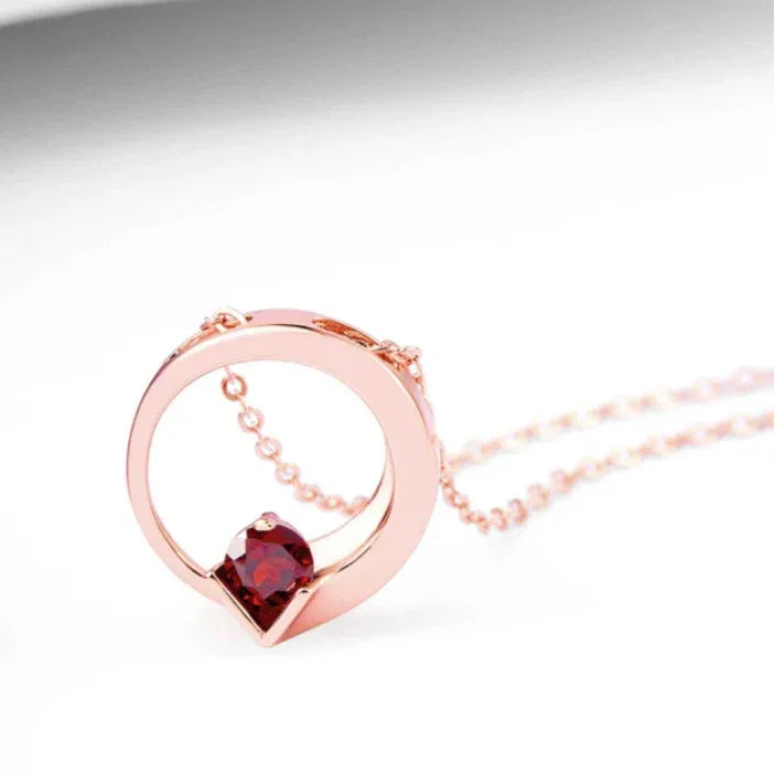 Garnet Circular Pendant Necklace close-up of the pendant and chain