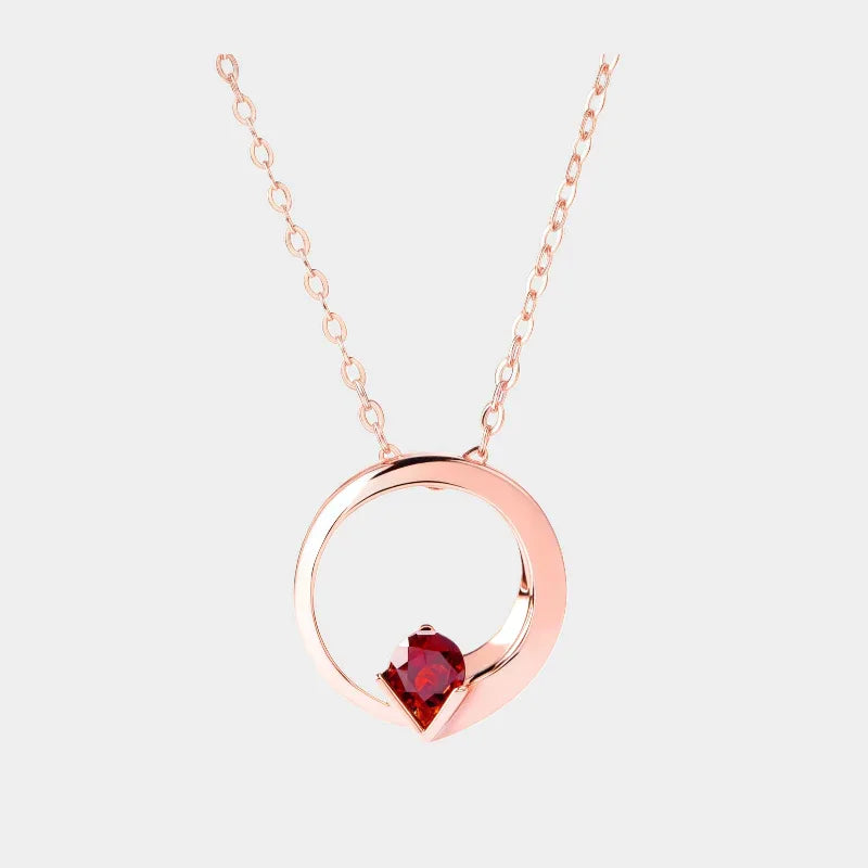 Garnet Circular Pendant Necklace full necklace view on a light background