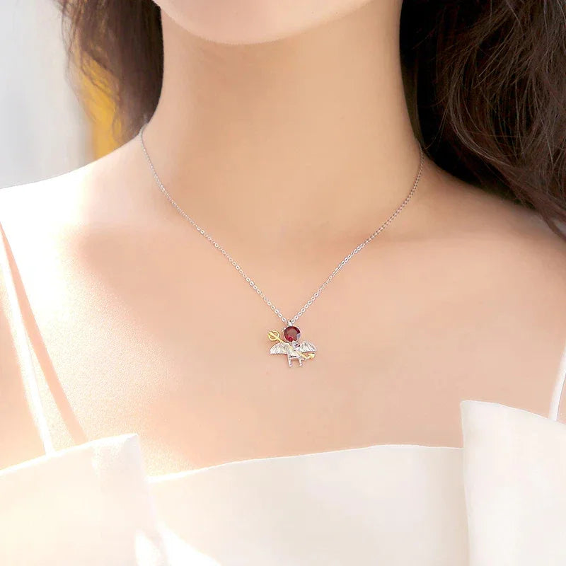 Garnet Devil and Wing Pendant Necklace side or angled pendant detail