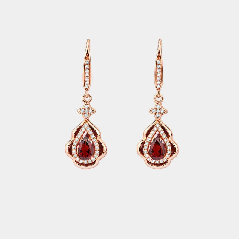 Garnet Filigree Teardrop Earrings front product view on a light background