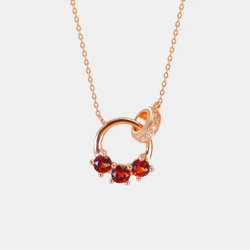 Garnet Interlocking Circle Pendant Necklace full necklace view on a light background