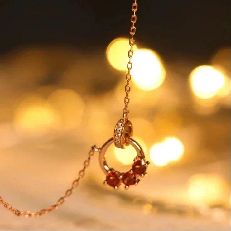 Garnet Interlocking Circle Pendant Necklace side or angled pendant detail