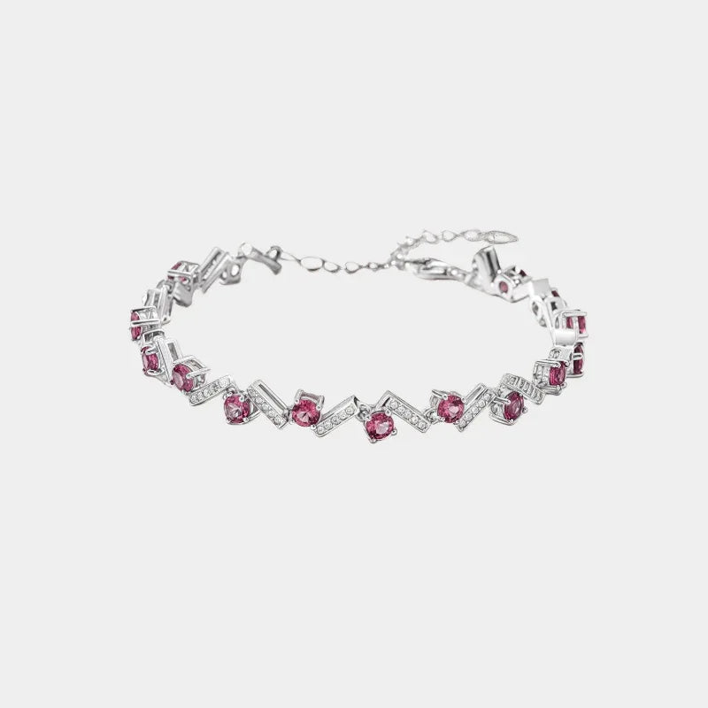 Garnet Leaf-Link Tennis Bracelet full bracelet view on a light background