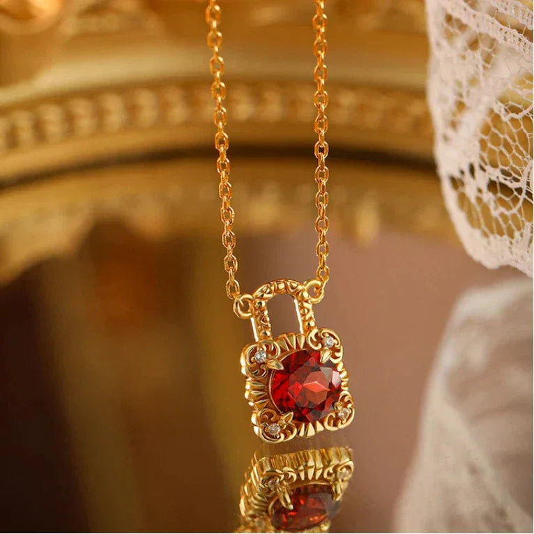 Garnet Padlock Pendant Necklace close-up of the pendant and chain