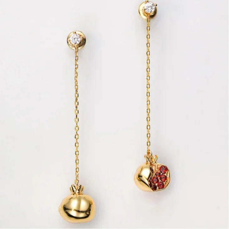 Garnet Pomegranate Threader Earrings angled product detail on a jewelry display