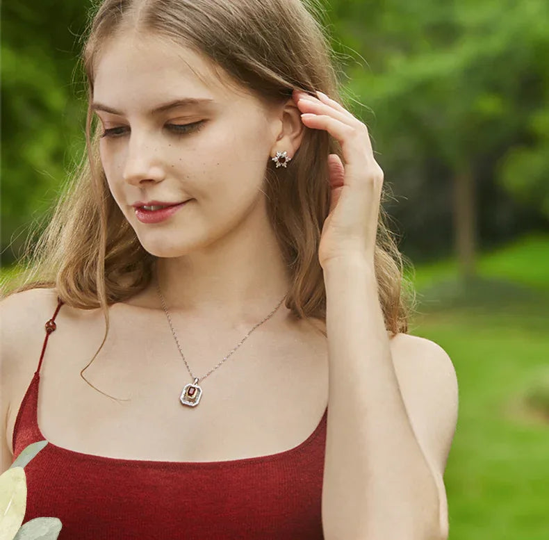 Garnet Snowflake Halo Stud Earrings rear and band detail view