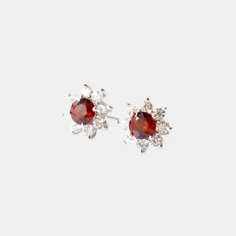 Garnet Snowflake Stud Earrings front product view on a light background