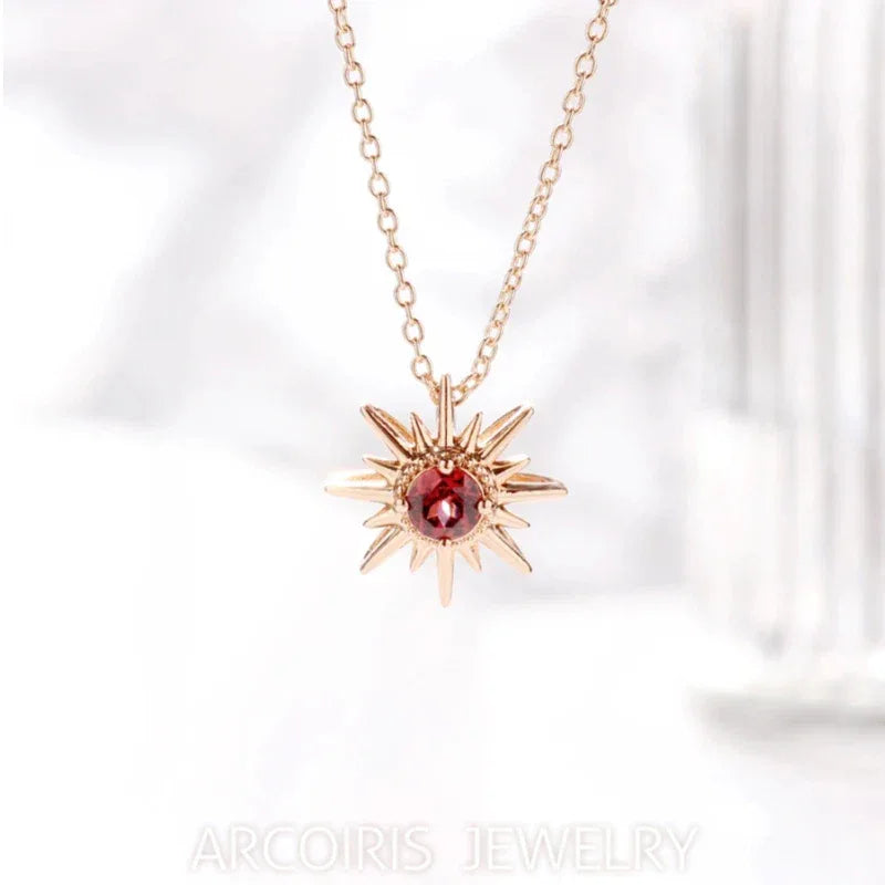 Garnet Sunburst Pendant Necklace close-up of the pendant and chain
