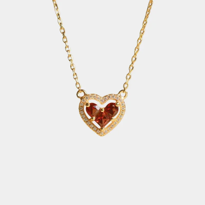 Garnet Triple-Stone Heart Necklace full necklace view on a light background