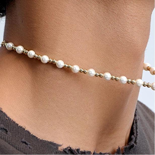 Gold-Plated Brass and Pearl Beaded Necklace — close neckline-worn view showing the alternating pearls and gold links