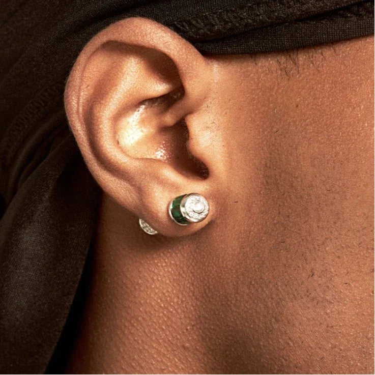Gold-Tone Two-Tone Emerald Cylindrical Stud Earrings worn on the ear from a second angle