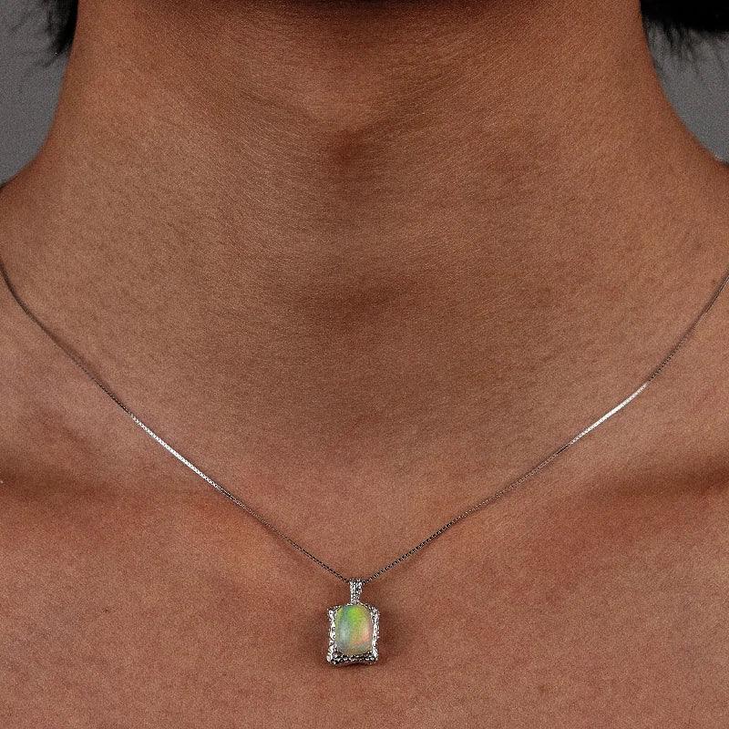 Golden Opal Rectangular Pendant Necklace worn at the neckline from another angle