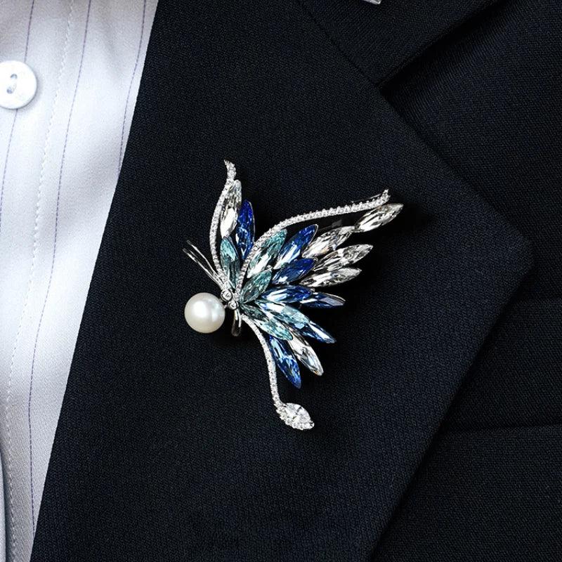 Gradient Blue Butterfly Pearl Brooch with Cubic Zirconia — close blazer-worn view showing the brooch at the lapel