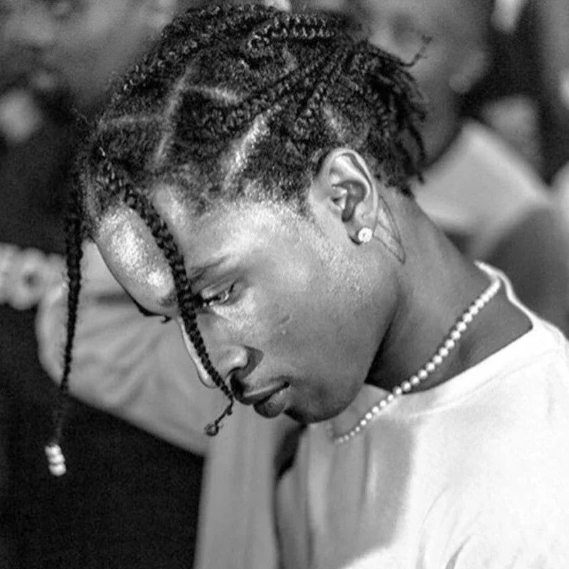Classic Pearl Strand Necklace — black-and-white side portrait showing the strand at the neck