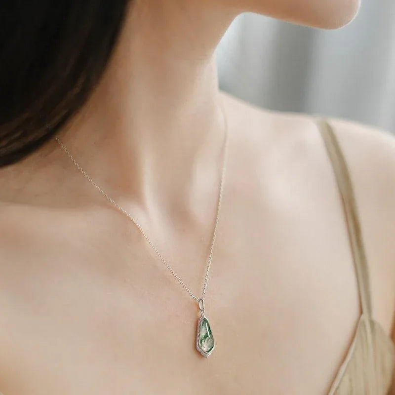 Elongated Teardrop Moss Agate Pendant Necklace — necklace worn at the neckline