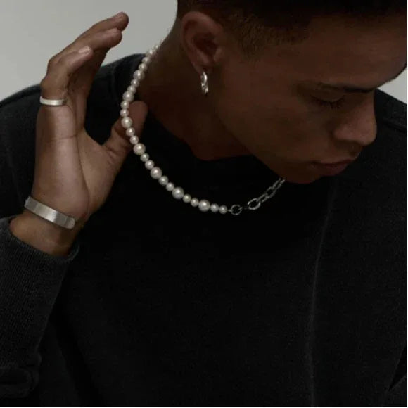 Pearl and Steel Chain Half-and-Half Necklace — portrait with a hand at the back of the neck