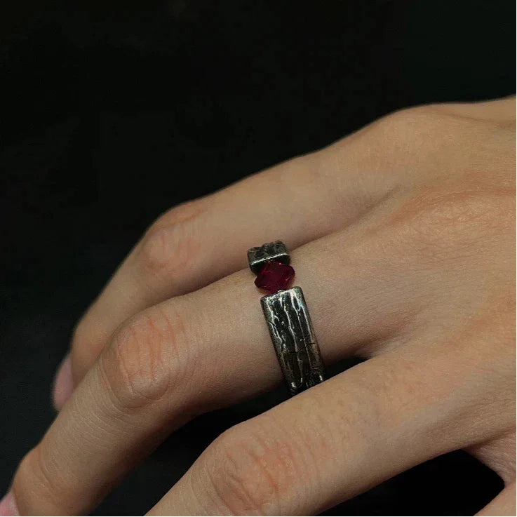 Hammered Silver-Tone Ruby Open Ring — angled ring view