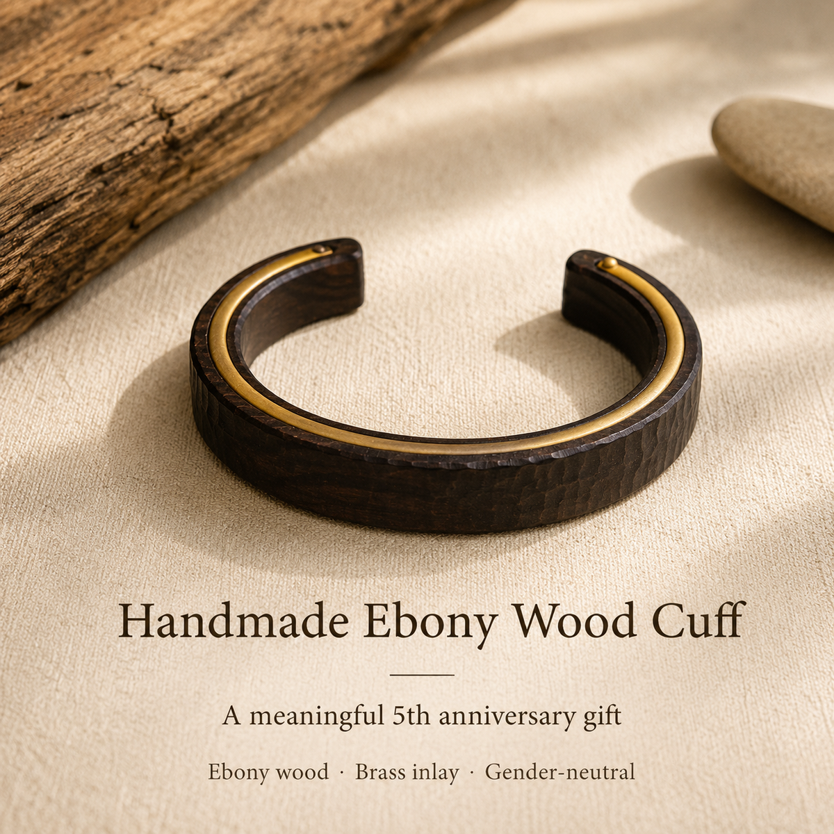 Handmade Ebony Wood & Brass Cuff Bracelet, styled product scene with anniversary-themed props