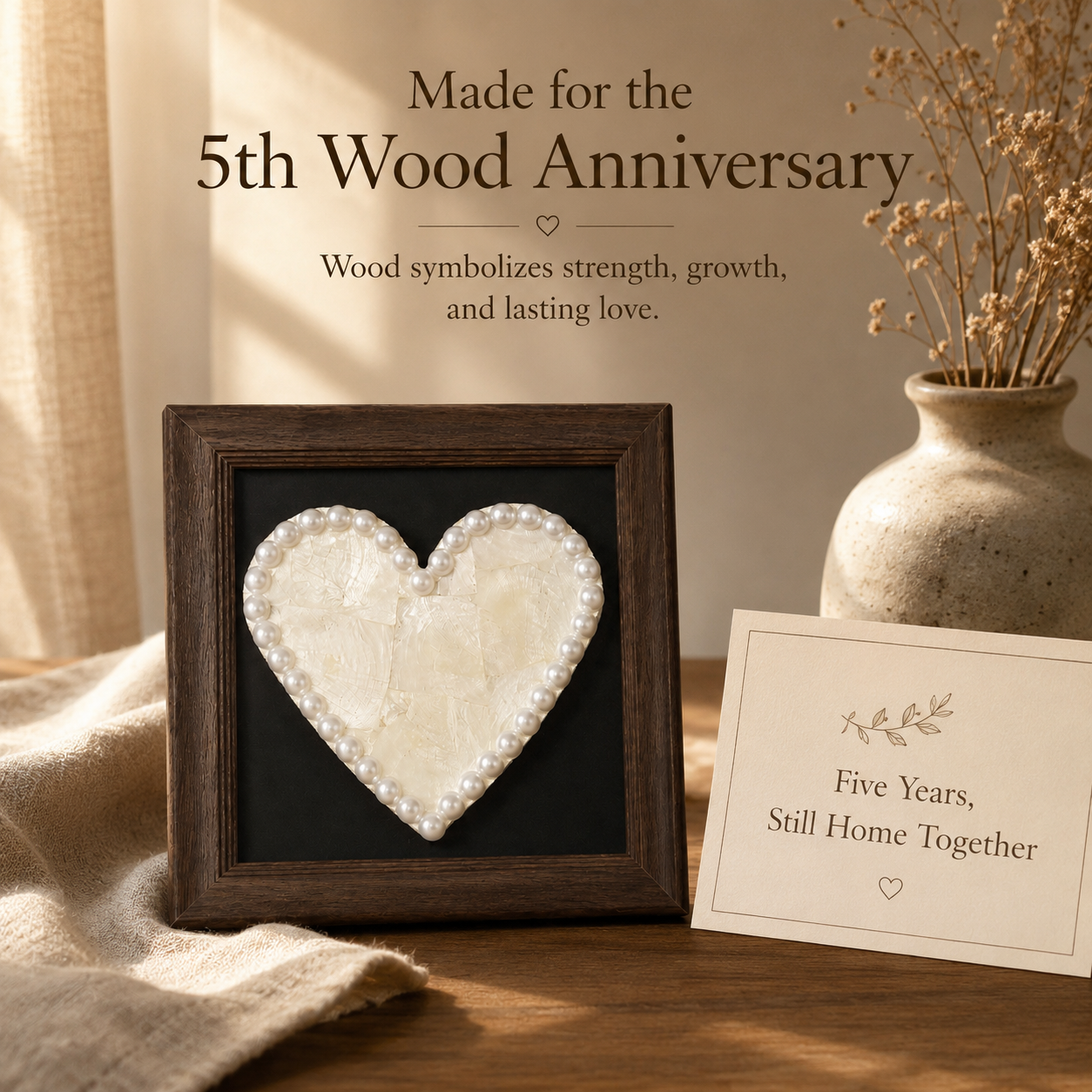 Handmade Shell Heart Wood Frame, styled product scene with anniversary-themed props