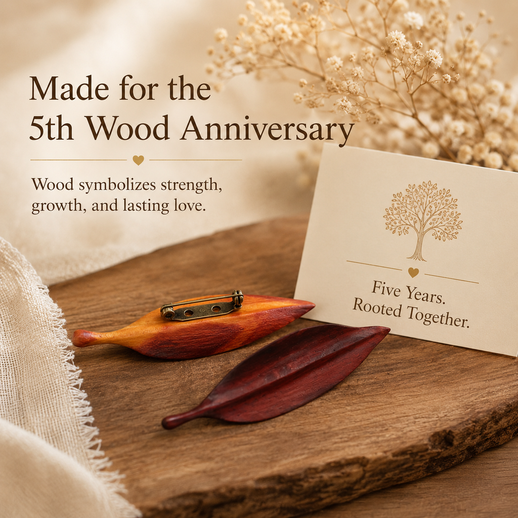 Handmade Wooden Leaf Brooch, styled product scene with anniversary-themed props