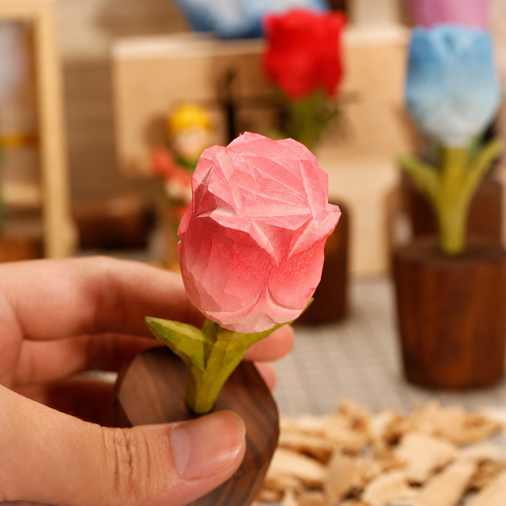 Handmade Wooden Rose, held in hand to show scale and surface detail