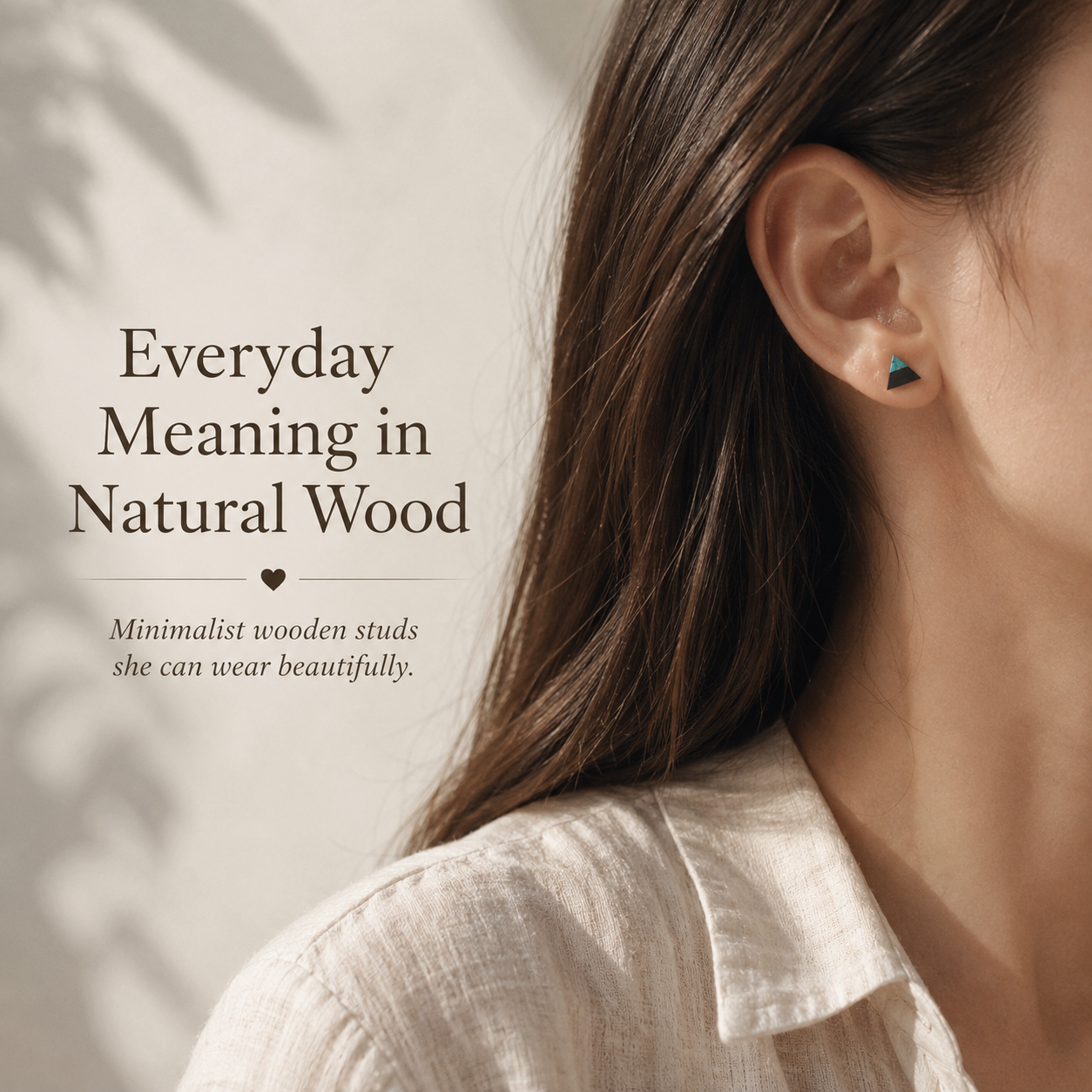 Handmade Wooden Triangle Stud Earrings, shown worn for scale and styling