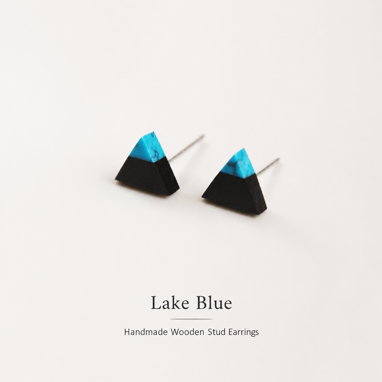 Handmade Wooden Triangle Stud Earrings, product view on a neutral background