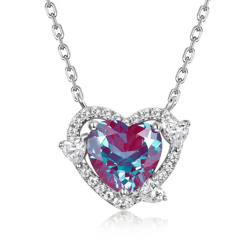 Heart Alexandrite halo pendant necklace with clear accents, front product view on a white background