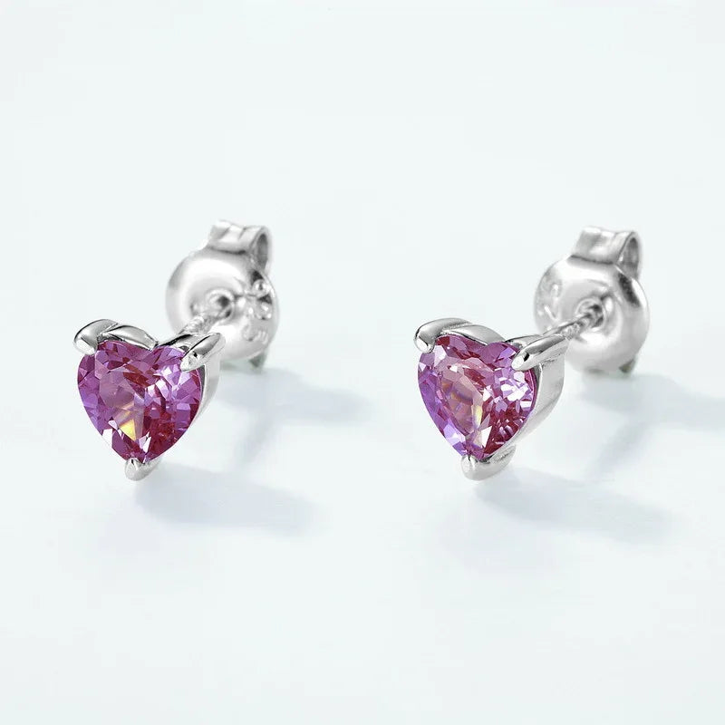 Heart Alexandrite stud earrings, pink-toned Alexandrite view under alternate lighting