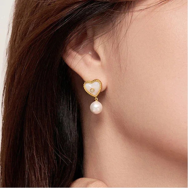 Pearl Drop Heart Earrings with Clear Center Accents — alternate right-ear worn close-up