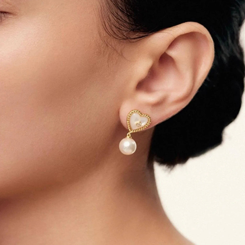 Pearl Drop Heart Earrings with Clear Center Accents — alternate left-ear worn side view