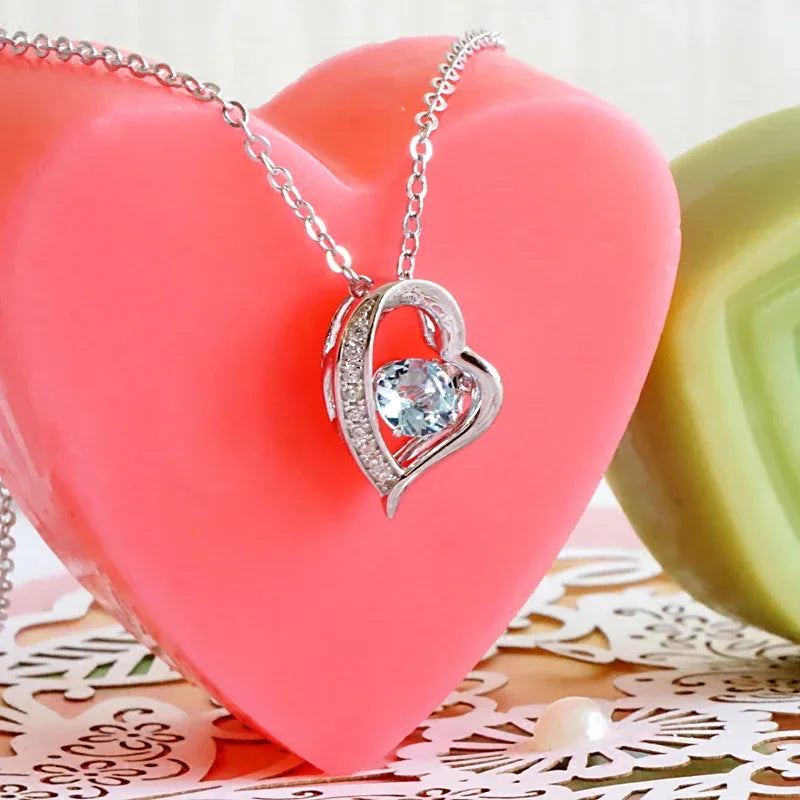 Heart-Cut Aquamarine Swirl Pendant Necklace styled neckline view showing pendant scale