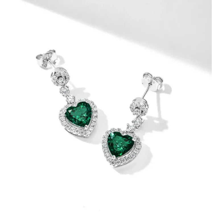 Heart-Cut Emerald Drop Earrings styled ear view showing scale