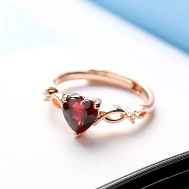Heart-Cut Garnet Adjustable Ring angled product detail on a jewelry display