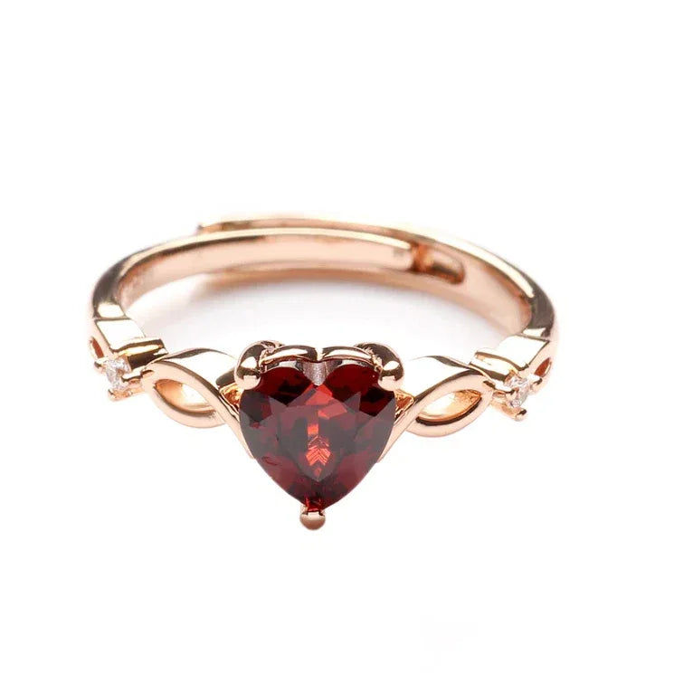Heart-Cut Garnet Adjustable Ring worn on the hand in a close-up